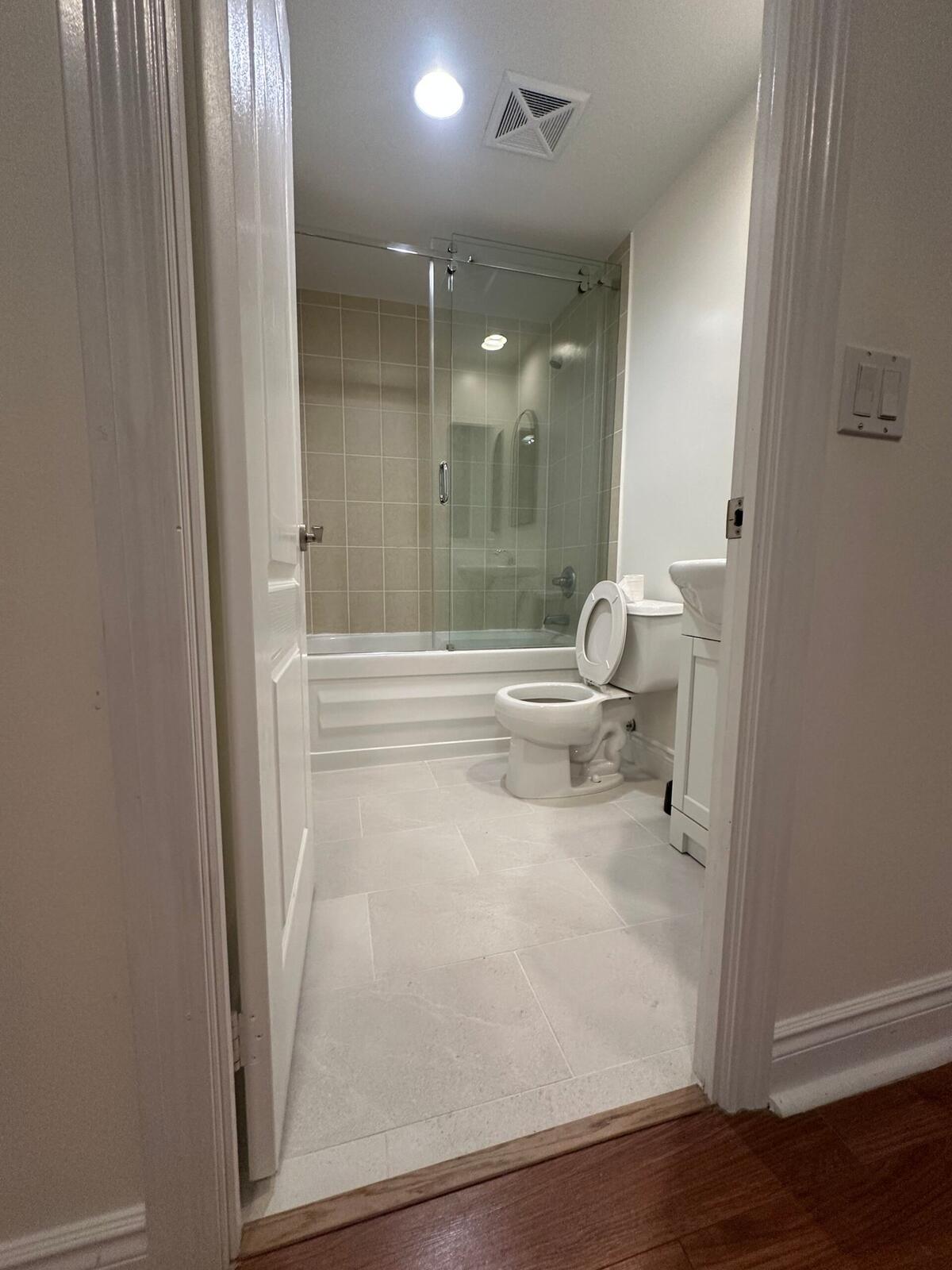 Modern bathroom renovation with glass shower